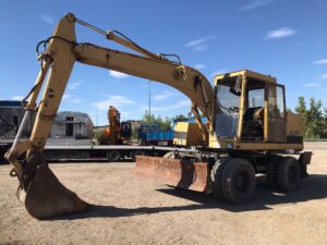 retroexcavadora de ruedas Caterpillar