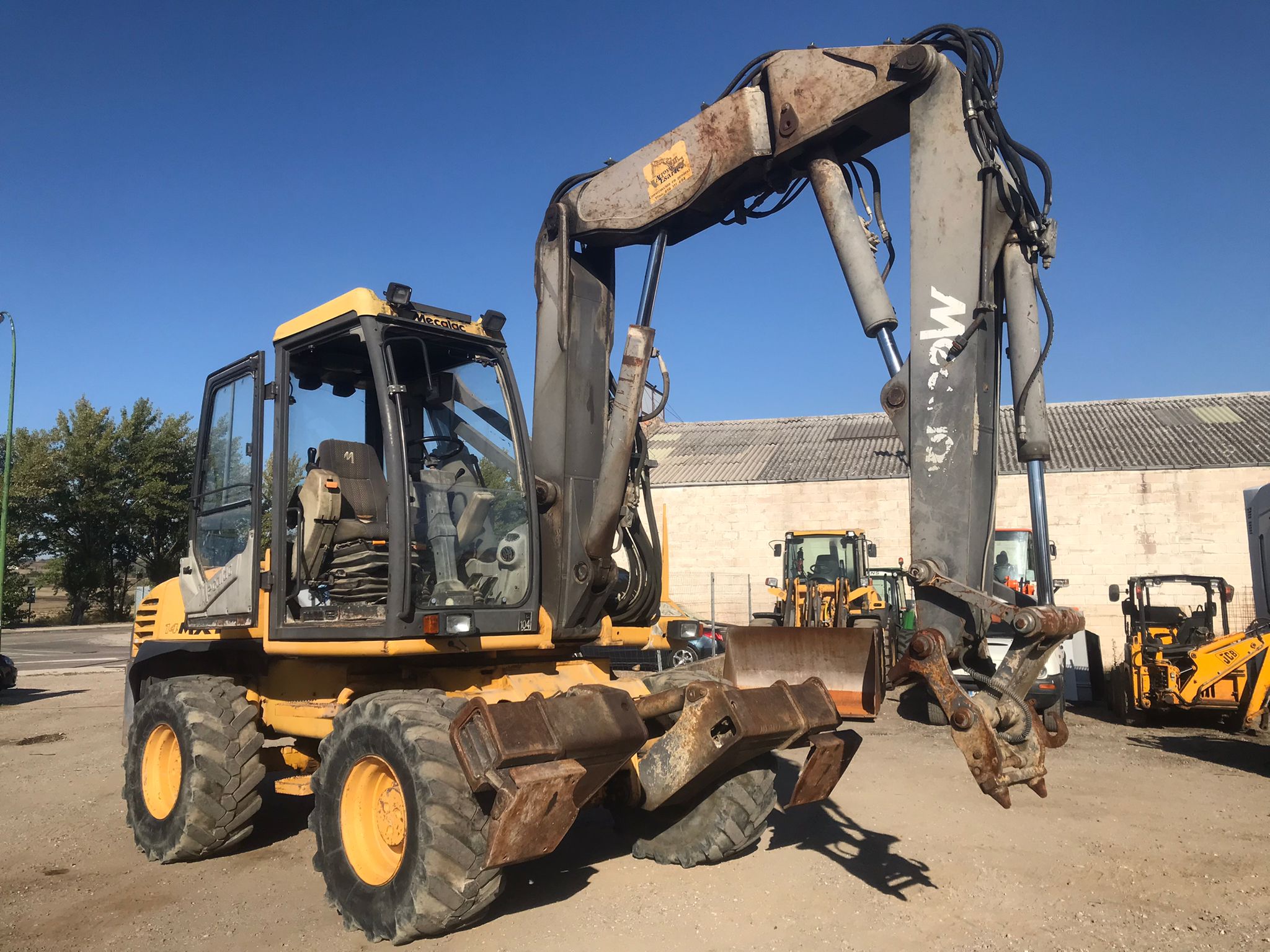 x- VENDIDO - Excavadora de ruedas articulada Mecalac 14MXT - 2001 - Imagen 2