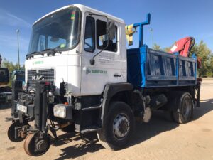 Camión grúa diploris ferroviario