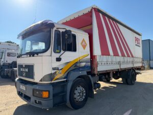 MAN 18.264 semitauliner vista frontal izquierda