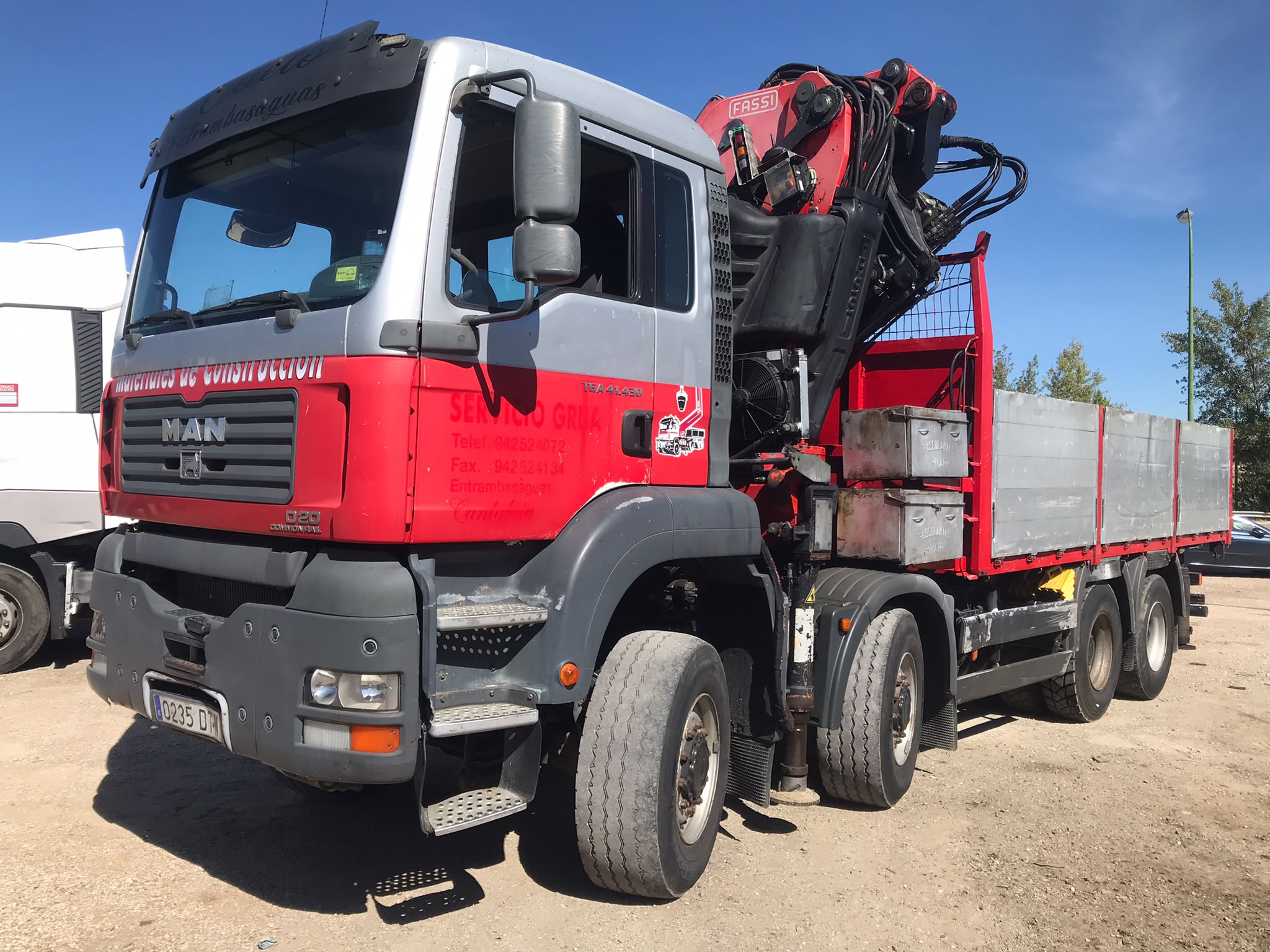 Man TGA 41.430 8×4 caja abierta y grúa – 2005